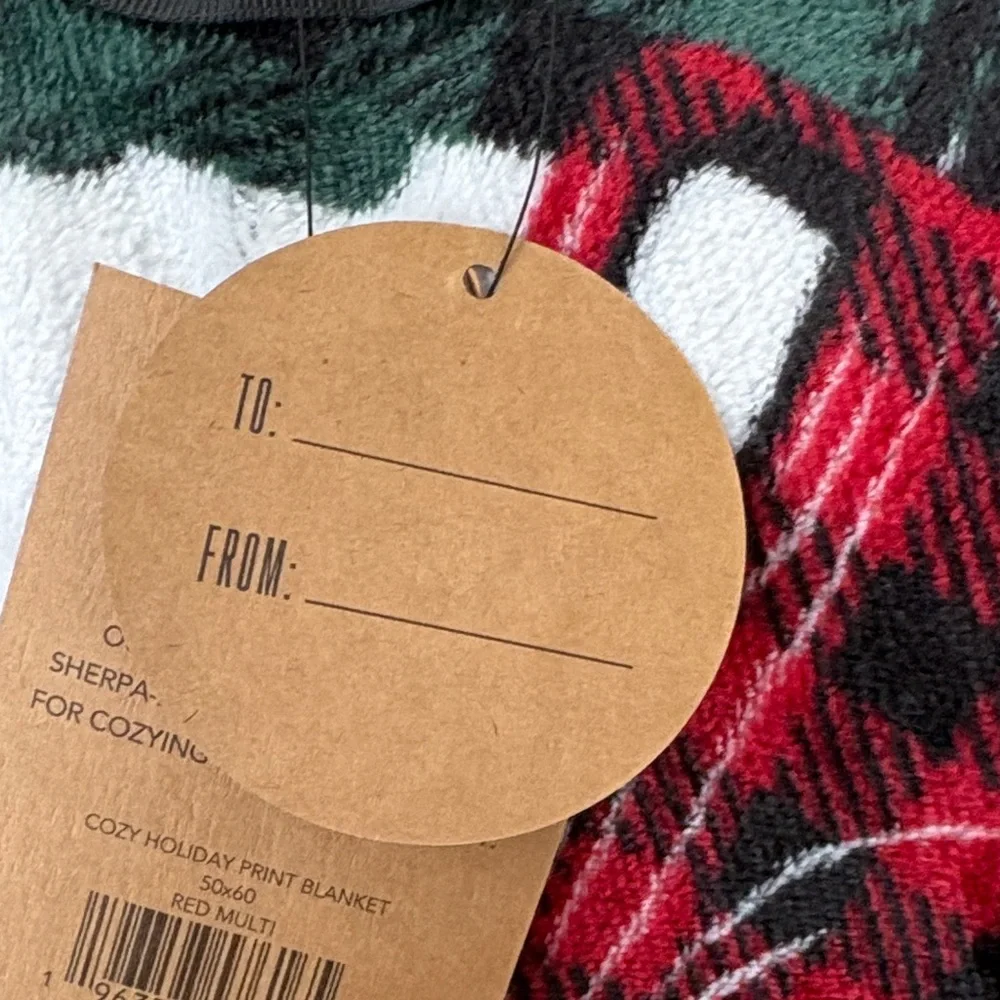 Cozy Holiday Blanket with Red and Black Plaid Design